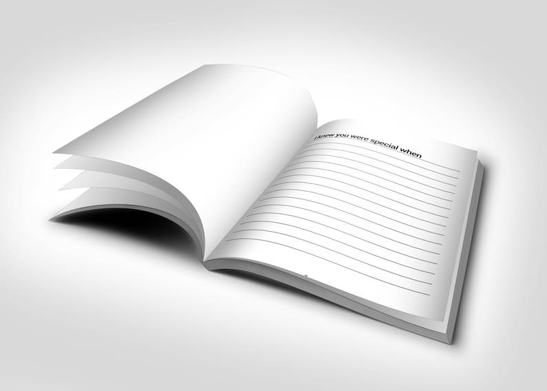 May include: An open notebook with blank, lined pages. The top page has the text "I knew you were special when". The notebook is white with a soft shadow, suggesting a clean and simple design, perfect for journaling or note-taking.