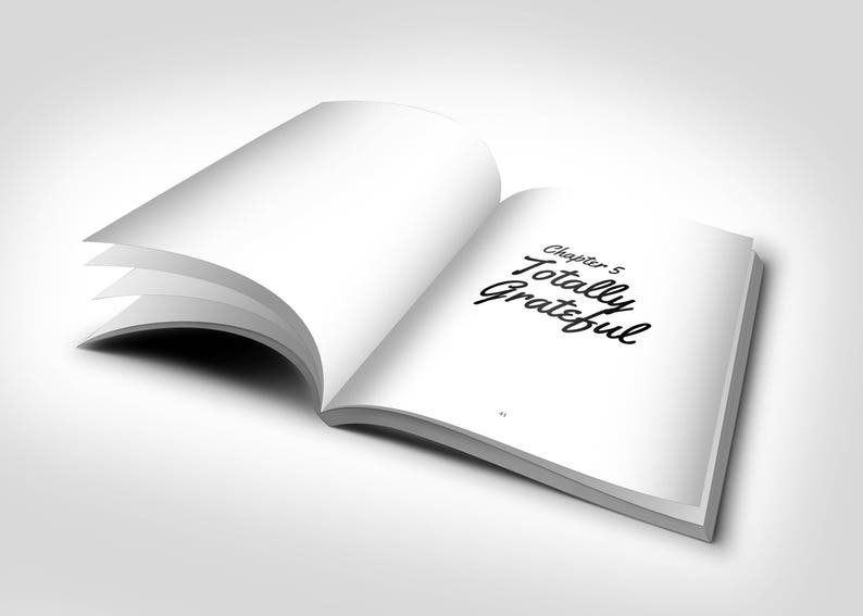 May include: An open book with white pages, displaying the text "Chapter 5 Totally Grateful" in black script. The book is slightly angled, with several pages visible, set against a white background.