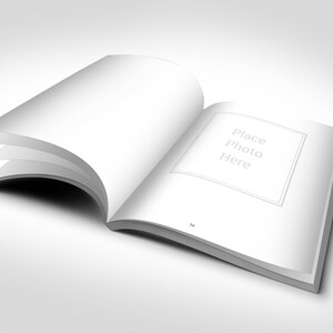 May include: An open book with blank white pages, ideal for showcasing photos or text. The right page features a bordered area with the text "Place Photo Here". The book is open to page 34.