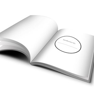May include: A blank white book with a black circle on the cover that says "This Belongs To".