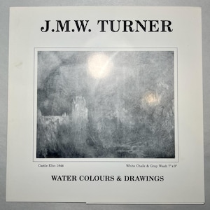 May include: A print featuring a grayscale artwork by J.M.W. Turner. The artwork, titled "Castle Eltz-1844," is a white chalk and gray wash piece, measuring 7"x9". The print's title is "WATER COLOURS & DRAWINGS," with the artist's name at the top.