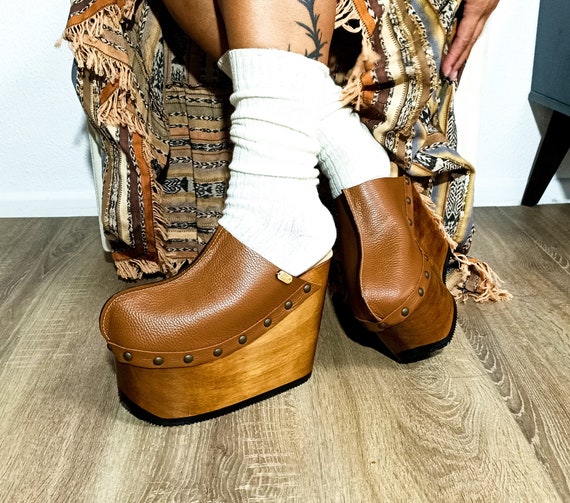 Vintage inspired 70 s style platform clogs with super high heels. The epitome of street fashion