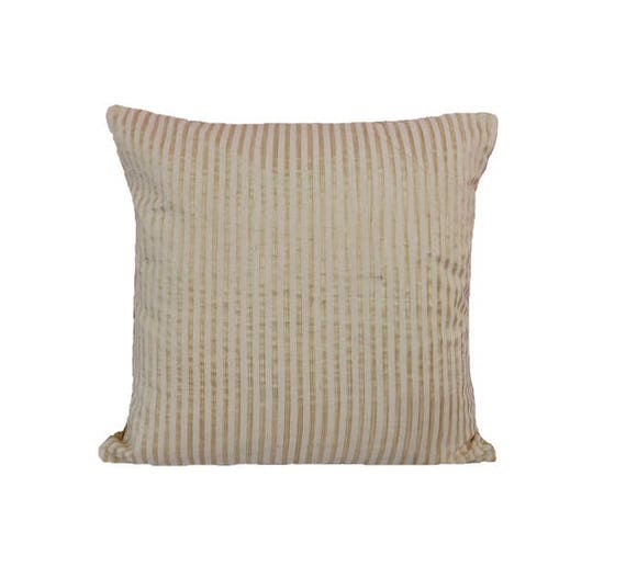 white and gold accent pillows