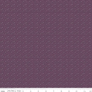 May include: Close-up of a fabric with a repeating pattern of small white dots and dashes on a deep purple background. The fabric has a textured appearance, with the dots and dashes arranged in horizontal rows.