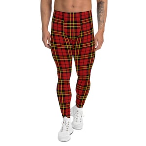 May include: Red, black and yellow tartan leggings. The leggings are close-fitting and have a sporty look.