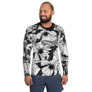 May include: Black and white long-sleeve shirt with a graphic print of koi fish, flowers, and waves.