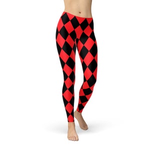 May include: Red and black diamond patterned leggings. The leggings are form-fitting and have a high waist.