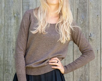 EXQUISITE KNITWEAR made of 100% natural WOOL and door EXQUISITE KNITWEAR made of 100% natural WOOL and door