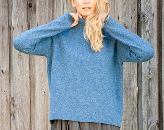 EXQUISITE KNITWEAR made of 100% natural WOOL and door EXQUISITE KNITWEAR made of 100% natural WOOL and door