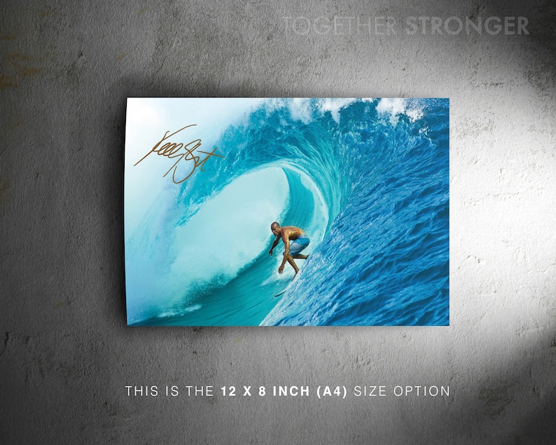 May include: A surfer rides a large, blue wave. The wave is breaking and curling over the surfer. The surfer is wearing blue shorts and is holding a surfboard. The image is a photograph and has the text "TOGETHER STRONGER" at the top.