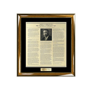 May include: A framed print of Martin Luther King Jr.'s "I Have a Dream" speech. The print features a black and white photo of King and the full text of his speech delivered on August 28, 1963, at the March on Washington for Jobs and Freedom.