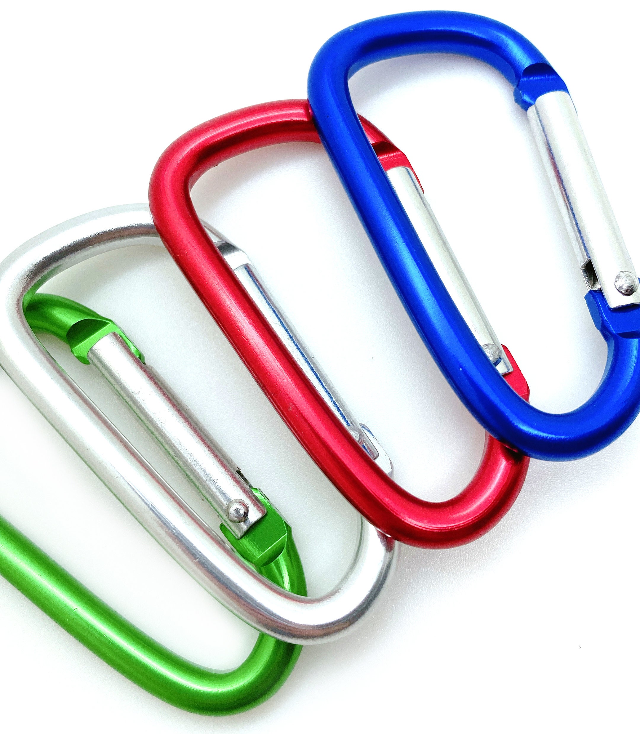 Carabiner key chain attaches to your bag or briefcase. Spring-hinge allows  easy release of the clip and quick access to keys. Carabiner key chain  mimics the look of the climber clip but