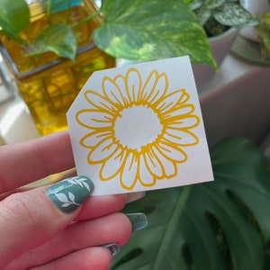Simple Daisy - Glossy Yellow Flower Decal for Car Window, Laptop, Rear View Mirror, and More! Permanent Vinyl Bumper Sticker
