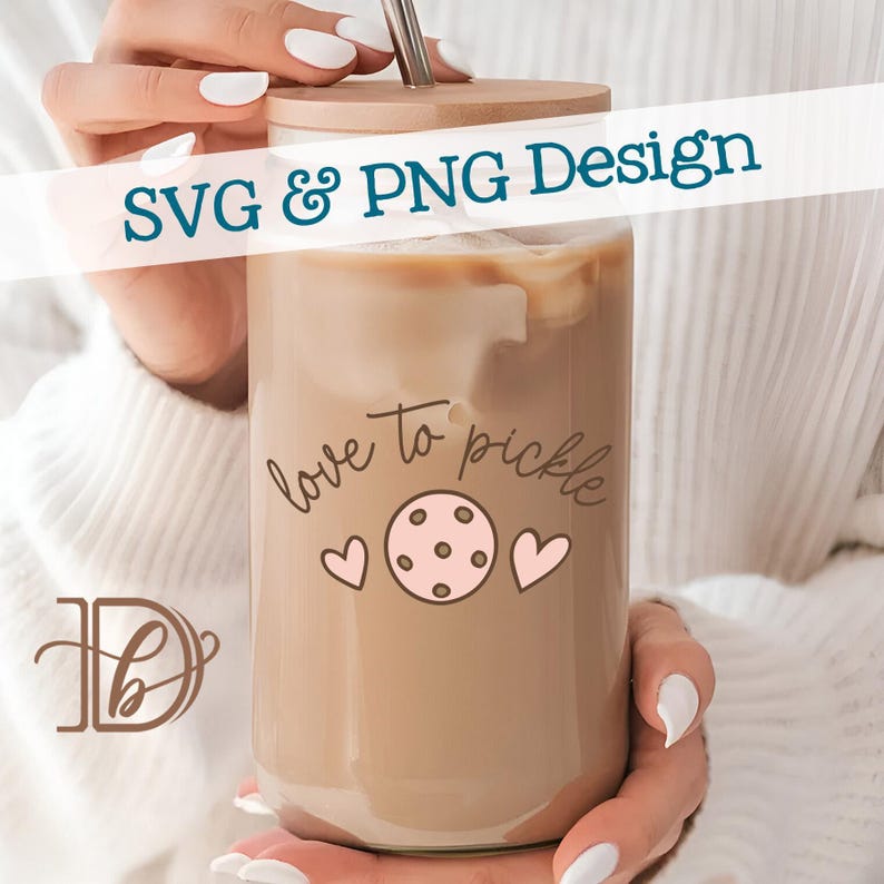 May include: A clear glass tumbler filled with a light brown beverage, featuring a wooden lid and a metal straw. The tumbler is decorated with the phrase "love to pickle" and a pickleball graphic. The text "SVG & PNG Design" is displayed across the top.