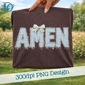 May include: A brown t-shirt with the word "AMEN" appliqued in light blue gingham fabric with frayed edges. A white lace bow is centered above the "E". The bottom of the image has the text "300dpi PNG Design".