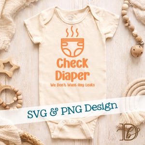 May include: Cream baby bodysuit featuring an orange diaper graphic and the words "Check Diaper" and "We Don't Want Any Leaks." The bodysuit has short sleeves and snap closures. The words "SVG & PNG Design" are written across the bottom.