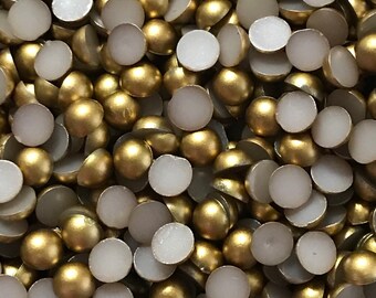 Gold flatback pearls