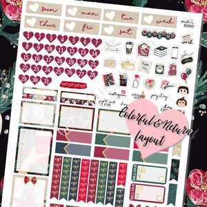 May include: A set of Christmas-themed planner stickers featuring a calendar, days of the week, and various festive icons. The stickers are in shades of red, green, gold, and white with a glittery finish.