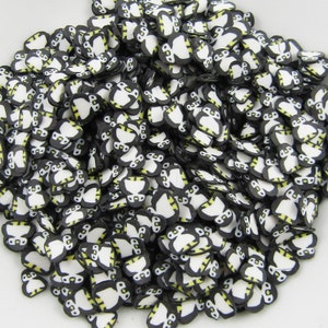 20 g de gaufrettes en pâte polymère Pingouin noires et blanches saupoudrées de résine