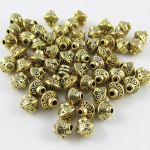 50pcs Scroll Bicone Spacer Beads 7x6mm Hole 1mm Antique Gold