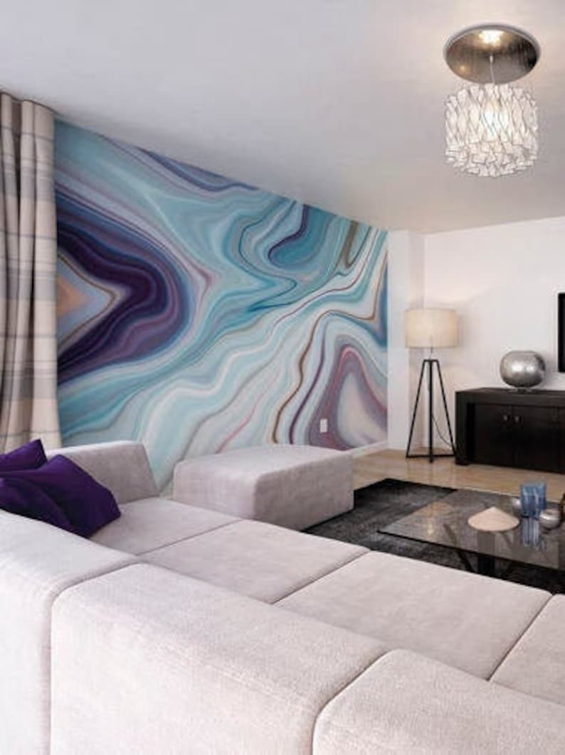 This stunning wall mural features a abstract design with a blue and purple marble effect. The finely-layered colors twist and turn in organic movement, blending softly into one another to create a unique and eye-catching swirl effect.