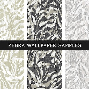 May include: Three samples of zebra print wallpaper. The first sample is a light beige and white zebra print. The second sample is a dark grey and white zebra print. The third sample is a light grey and white zebra print. The text "ZEBRA WALLPAPER SAMPLES" is printed across the top of the image.