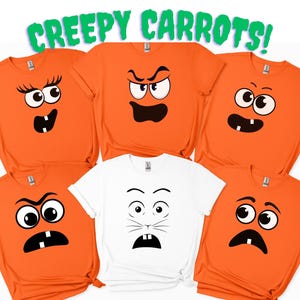 May include: Orange t-shirts with various cartoon faces, including angry, surprised, and goofy expressions. One white t-shirt features a similar face design. The text "CREEPY CARROTS!" is displayed above the shirts in green.