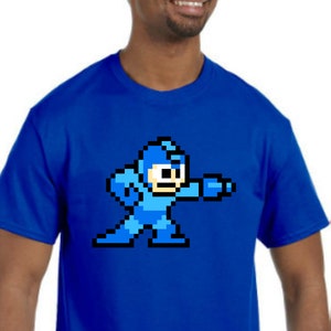Maglietta Mega Man Novità *Scegli colore e taglia* - (Nintendo NES, SNES, Wii)