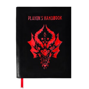 May include: A black leather-bound book with a red dragon design on the cover. The title "PLAYER'S HANDBOOK" is printed in white on the cover.