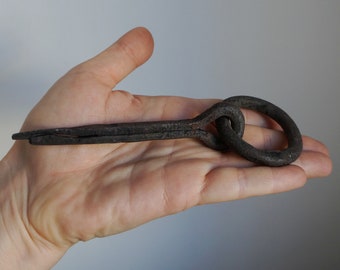 Small hand forged iron split nail for wood with ring for hitching hanging objects vintage architectural salvage for restorations