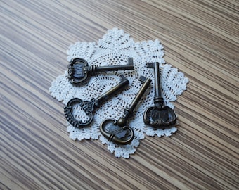 Set di 4 chiavi vintage scheletrate, chiavi in ferro placcate in ottone decorato per armadietti, cassetti, portagioie, oggetti da collezione, bomboniere, decorazioni eleganti