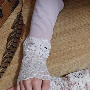 Pink sleeves with lace. Long knitted mitts. Long sleeves. Muslim accessory.