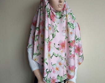 Elegant pink silk hijab with floral patterns