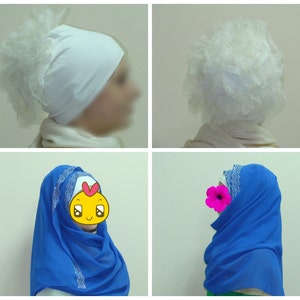 May include: Two different styles of white head coverings. The first is a white fabric head covering with a ruffled edge. The second is a white fabric head covering with a ruffled edge and a blue fabric scarf.