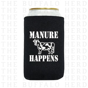 May include: Black neoprene can cooler with a white cow silhouette and the text "Manure Happens".