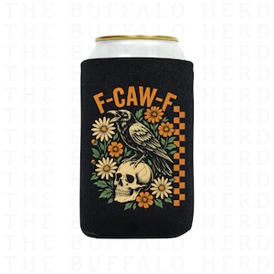 May include: Black can cooler with the text "F-CAW-F" in orange. The design features a raven perched on a skull, surrounded by orange and white flowers. A checkered pattern is on the right side of the cooler.