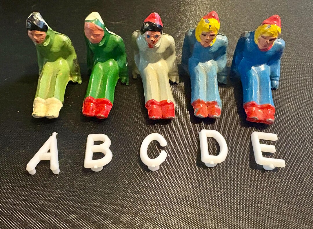 Sitting Sledding Figurines by Barclay Toys. Made in the 1930s/1940s ...
