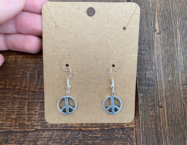 peace sign silver dangly earrings