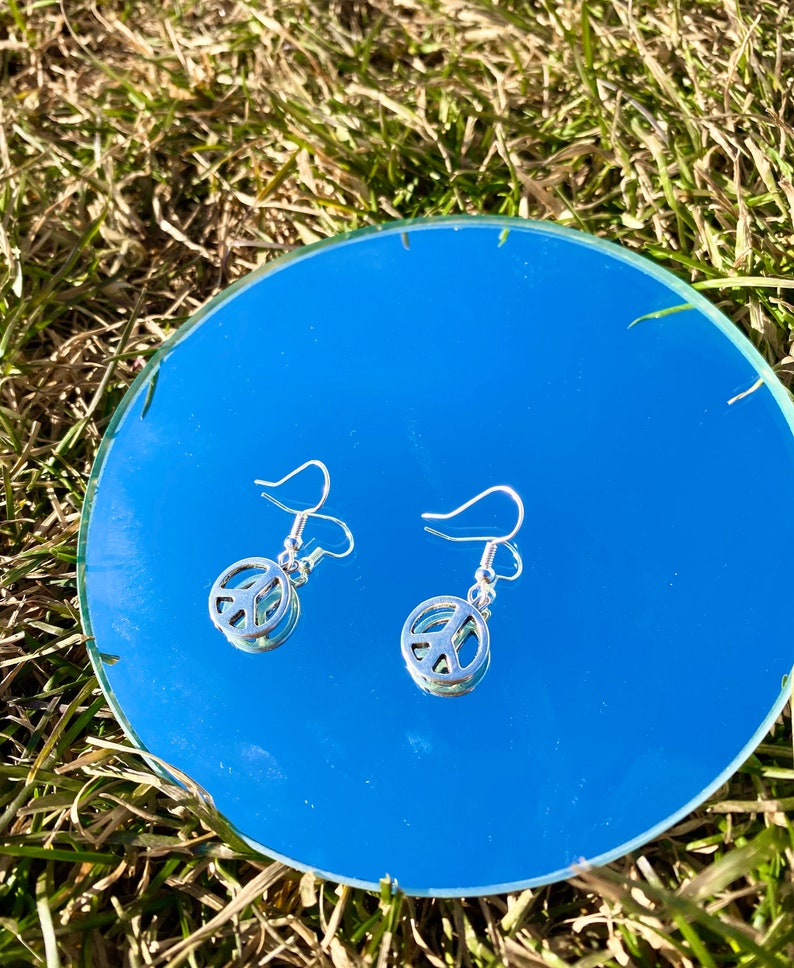 peace sign silver dangly earrings