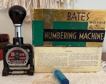 Numeradora Bates vintage de 6 ruedas y múltiples movimientos (3976)