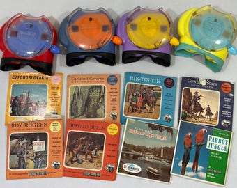Fyra View-Master-tittare och rullar - Fisher Price View-Master Toploader åtta rullar (3471)