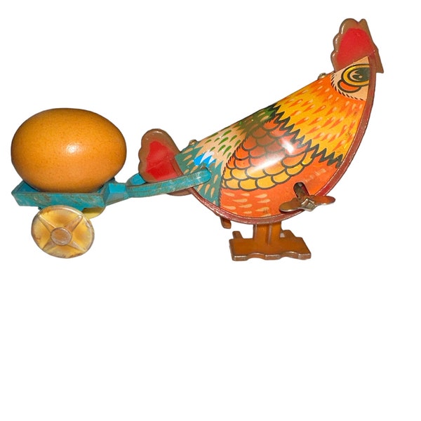 Vintage 80’s Russ Berrie Tin Litho Wind Up Hen Pulling Egg Easter Decoration Toy Works Well