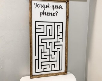 Forget your phone maze bathroom sign