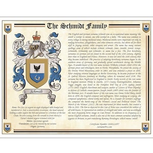 May include: A framed family crest featuring the name "Schmidt" with a detailed coat of arms. The crest includes a shield with an eagle and a banner with the family name, set against a parchment-style background.