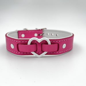 Pink leather choker/collar with white and silver hardware