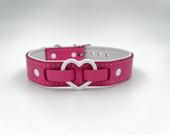 Pink leather choker/collar with white and silver hardware