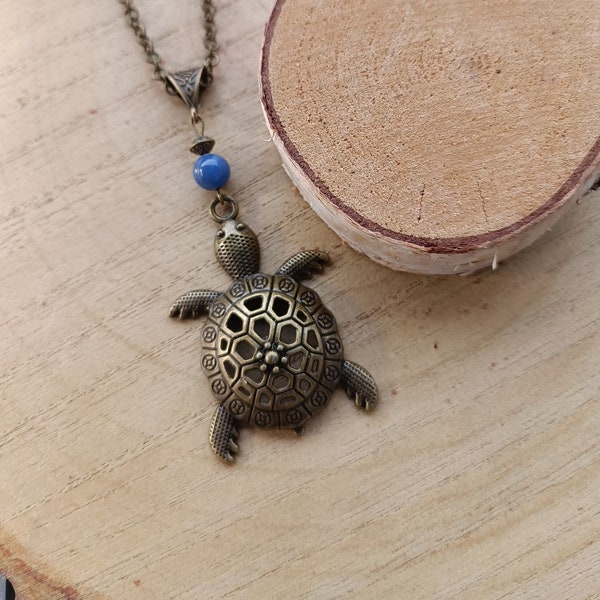 Collier ou sautoir bronze tortue avec perle en aventurine bleue