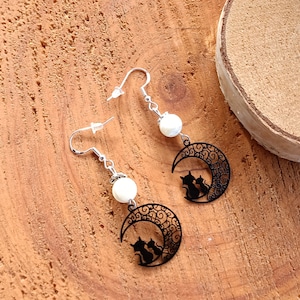 Cat and kitten earrings, with mother-of-pearl beads.