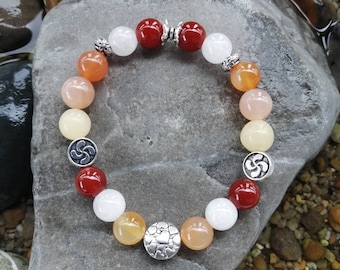 Basque cross bracelet with carnelian, yellow aventurine, white agate, yellow calcite and moonstone