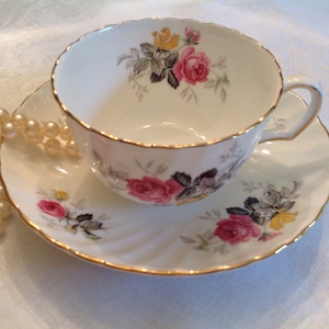 Adderly teacup and saucer with offset back stamp